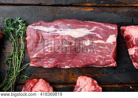 Raw Beef Filet Mignon Steak Cut Set, On Old Dark  Wooden Table Background, Top View Flat Lay