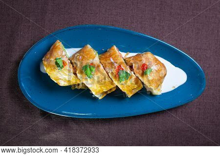 Top View Puff Pastry Roll With Fish Filling.