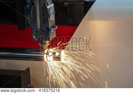 The Fiber Laser Cutting Machine Cutting The Stainless Steel Tube Control By Cnc Program. The Sheet M