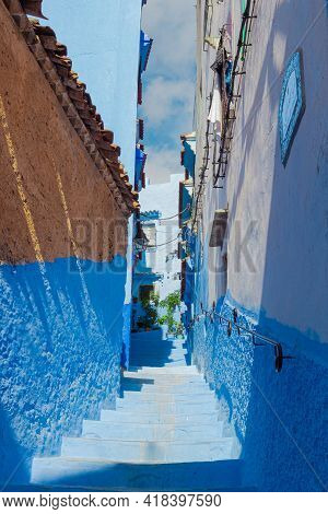 Narrow Empty Street-stairs In The Medina Of The Chefchaouen, Morocco. Blue Pearl In The Mountains Of