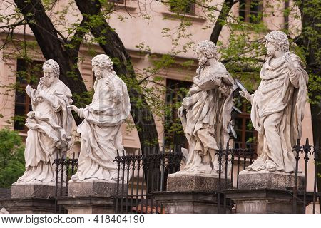 Fence With Statues Of The Apostles. Made In 1772 By David Geel From Pinchow Limestone. Heavily Damag