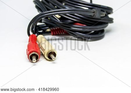 Two Red And White Audio Rca Plugs Isolated On A White Background. Analog Technology. Commonly Used T