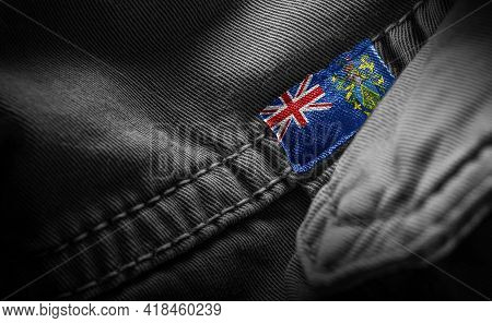 Tag On Dark Clothing In The Form Of The Flag Of The Pitcairn Islands