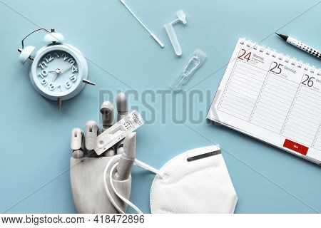 Week Planner, Schnelltest, Rapid Corona Test In German Language. Hand In Glove Holds Express Antigen