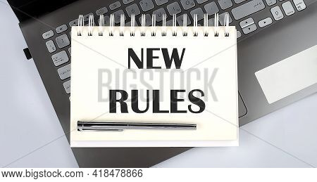 New Rules - Top View Notebook Writing On Laptop