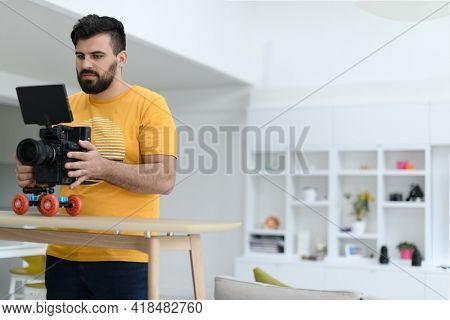 cameraman with professional equipment shoots video clips