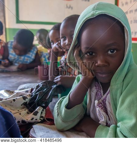 Mzuzu, Malawi. 30-05-2018. Portrait Of A Beautiful Afro-descendent Girl While Having Class At A Rura
