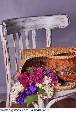 Stillife With Lilak Flowers And Hat On Vintaje Cher