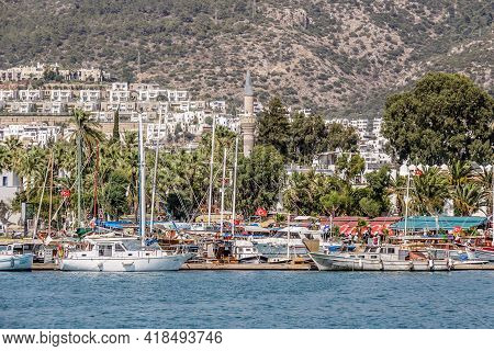 Bodrum, Turkey, July 2016: Bodrum Marina, Turkey, With Boats, Yachts And Tourists With The Mosque Mi