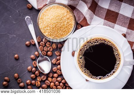 Cup Of Fragrant Fresh Coffee On A Dark Stone Background