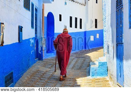 Unknown Elderly Man In Medina Quarter In Chefchaouen, Morocco. The City, Also Known As Chaouen Is No