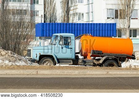Agidel, Russia - April 8, 2021: Special Machine For Pumping Out Sewage On A City Street