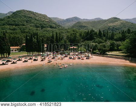 View Of The Royal Beach Of Przno, Green Mountain Slopes And Forest