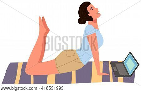 Young Woman Working Out Doing Exercises At Home. Girl Doing Yoga On Mat. Sportswoman Stretches In Ap