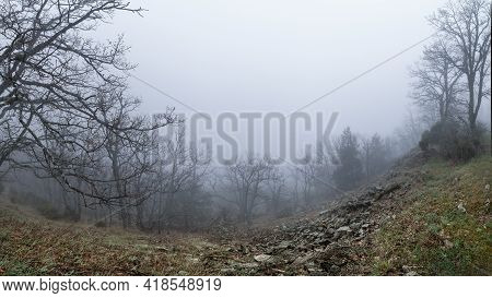 Panoramic Mountain Landscape On A Day With Intense Fog And Low Visibility. Morcuera.