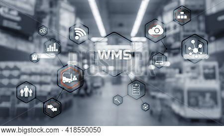 Inscription Wms On Blurred Warehouse Background. Werehouse Management System