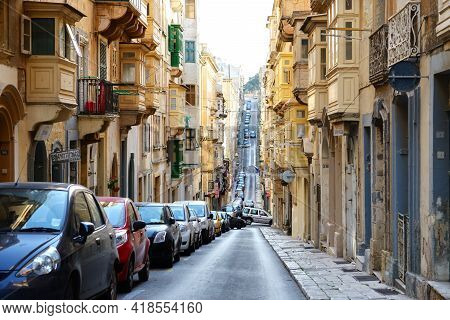 St Julians, Malta - April 23: The Street And Traditional Old Buildings In Valletta On April 23, 2015