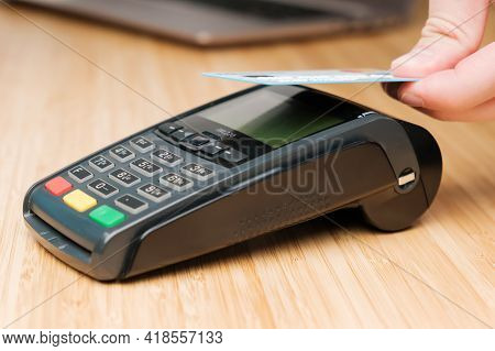 Close Up Man Hand Paying With Contactless Credit Card With Nfc Technology Using Wireless Payment Ter