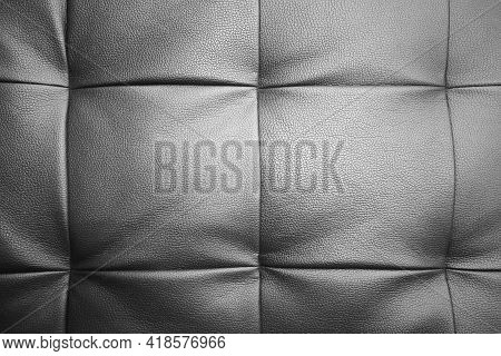 Detailed Background Of Soft Furniture Leather Or Leatherette Surface. Black White Textured Backgroun