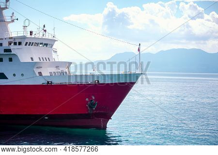 Large Red Cruise Ship Sailing On The Sea