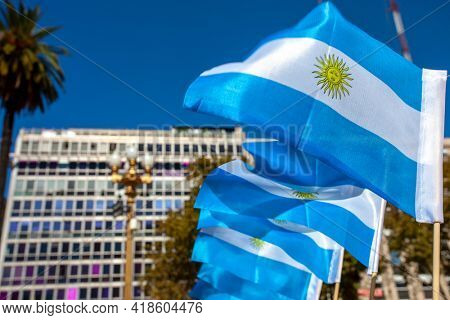 Soft focused Argentine flags at Plaza de Mayo in Buenos Aires