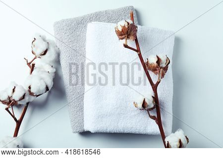 Cotton Plant Branches And Towels On White Background