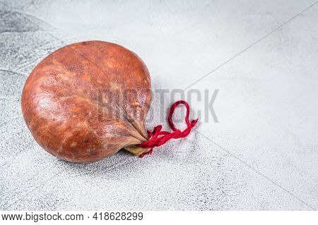 Sobrassada Cured Meat Sausage From Ground Pork, Paprika And . White Background. Top View. Copy Space