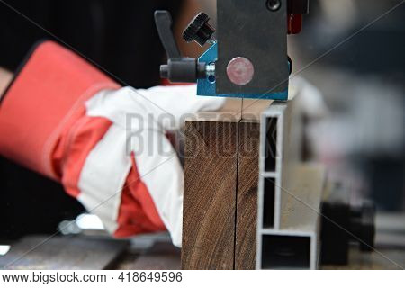 Cutting Of Ovangkol Wooden Plate On Band Saw. Guitar Making