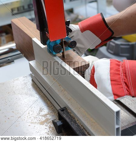 Cutting Of Ovangkol Wooden Plate On Band Saw. Guitar Making