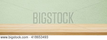 Wood Table And Green Wall Background In Kitchen, Wooden Shelf, Counter For Food And Product Display 