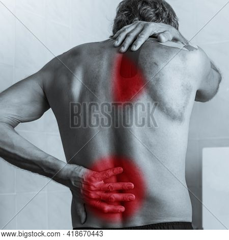 Back View Of Shirtless Man With Lower Back Pain, Black And White Photo
