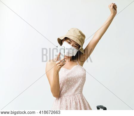 Asian Woman Taking Self Portrait By Smartphone With Smile While Wearing Protective Face Mask, Optimi