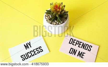 On The Stickers, The Texts My Success Depend On Me, Next To A Cactus Flower On A Yellow Background.