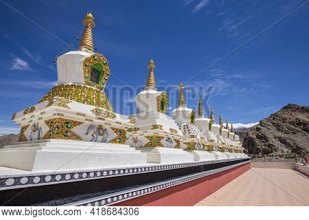 White Buddhist Stupa Or Pagoda In Tibetan Monastery Near Village Leh In Ladakh Region, Noth India