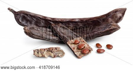 Ripe Carob Pods And Bean Isolated On White Background With Clipping Path And Full Depth Of Field