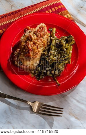 Goat Cheese Stuffed Chicken With Sundried Tomatoes And Side Of Garlicky Broccoli Rabe