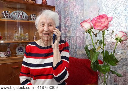 Senior Woman Talking On Phone Indoor