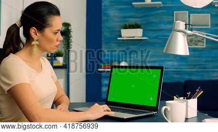 Business Woman Working At Online Coomunication Project Using Laptop Computer