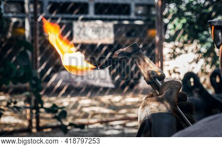 Close Up Hand Heavy Industrial Worker Is Working On Metal Work Factory Process By Cutting Sheet Stee