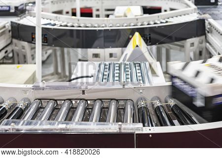 Roller Conveyor Of Automatic Production Line Of Manufacturing Process For Transportation Material Go