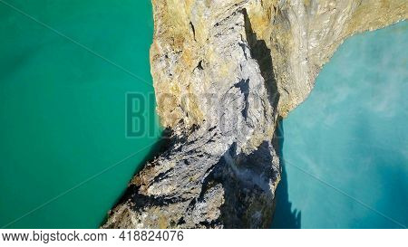 Rock Barrier Between The Volcanic Lakes Kootainuamuri And Alapolo. Two Of Three The Tricolor Volcano