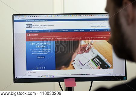 New York, Usa - 26 April 2021: Nih Website Page On Screen, Man Using Service, Illustrative Editorial