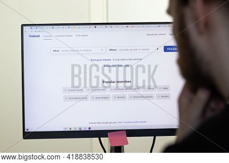 New York, Usa - 26 April 2021: Indeed Website Page On Screen, Man Using Service, Illustrative Editor