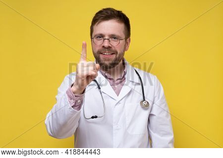 Calm, Benevolent Doctor Raised His Index Finger Up, He Found A Solution To The Problem And Is Very H