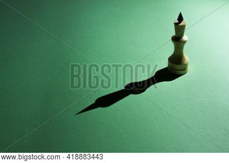 The Figure Of The Chess King And His Shadow. Self Confidence Concept. The Romance Of Chess. Green Pa
