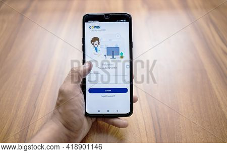 Maski, India 30,april 2021 : Focus On Thumb, Pov Shot Of Hands Registering For Vaccination On Co-win