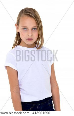 Blonde In A White T-shirt In The Studio On A White Background. Close-up
