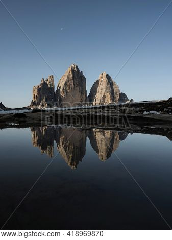 Mirror Pond Reflection Of Tre Cime Di Lavaredo Alpine Mountain Panorama In Sexten Dolomites Belluno 