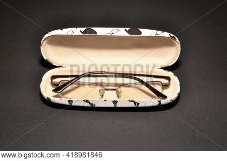 Glasses For Working At The Computer In A White Case On A Black Background