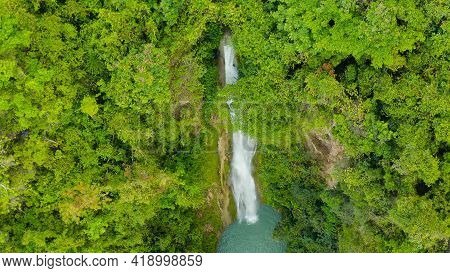 Aerial View Of Mantayupan Waterfalls In A Mountain Gorge In The Tropical Jungle, Philippines, Cebu. 